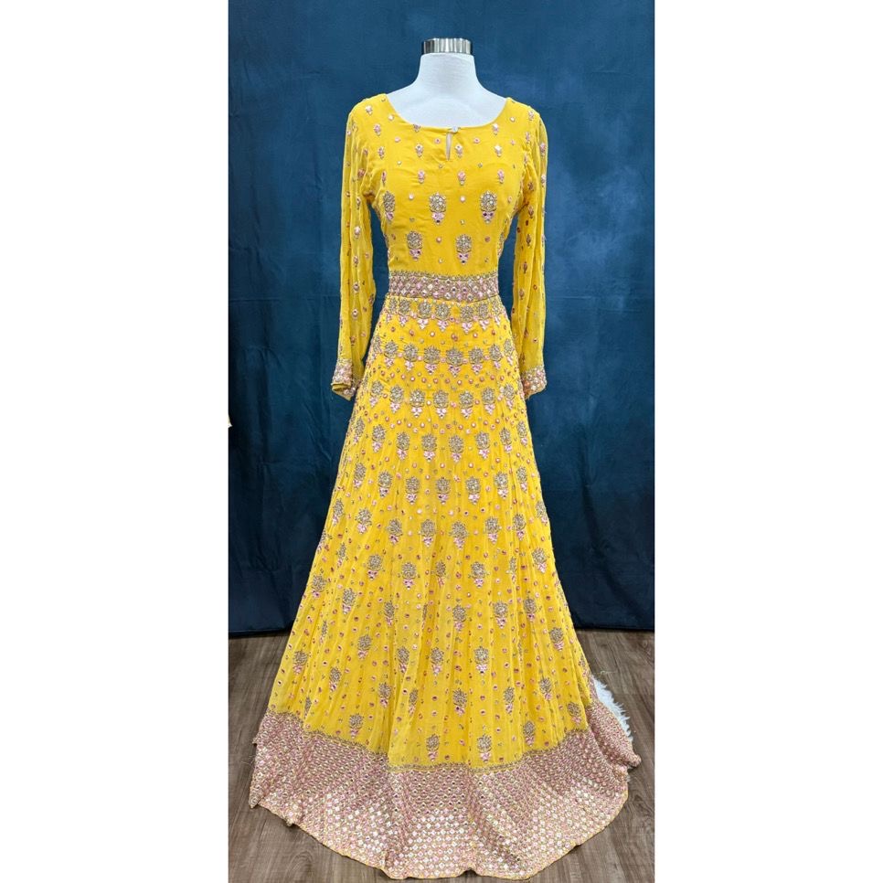 Soft hues, regal charm and magic in yellow. Available in Size 42. Step into royal vibes with this gorgeous georgette long gown & dupatta.