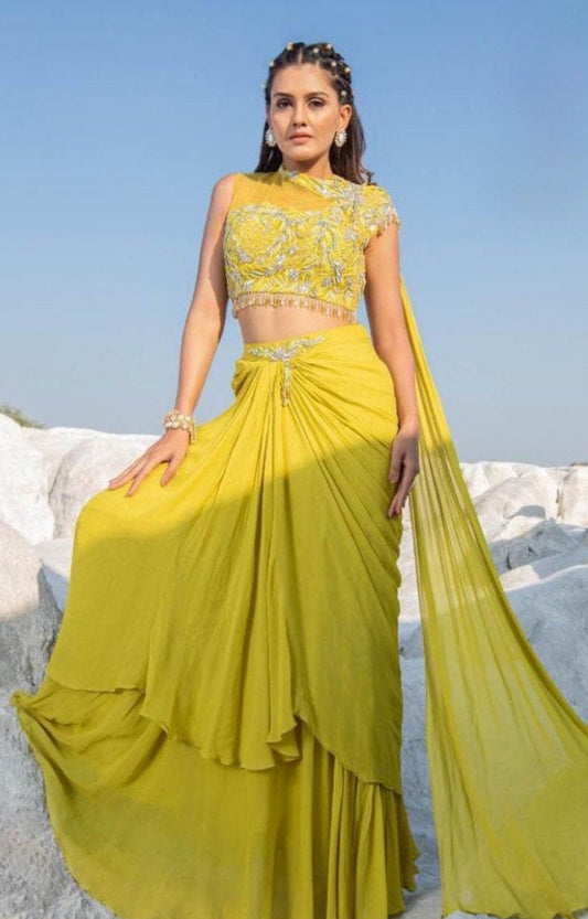 Trendy Croptop lehenga with Drape style attached Dupatta with trendy skirt for Haldi or party dress. Available inSize 40. Alterations extra