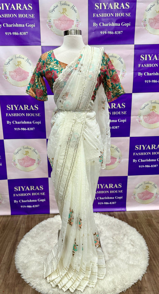 Beautiful crushed organza saree perfect for party wear. Blouse size available in size 40. Can be altered to your size.