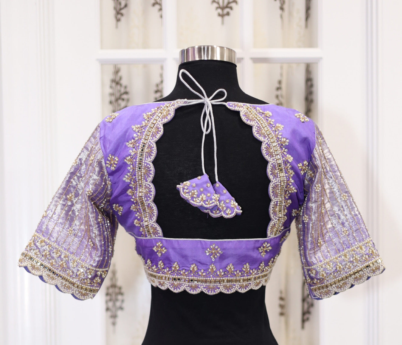 Lavender Pure Kanchi Pattu Saree (silk mark certified) with elegant Maggam work blouse with silver Zari border