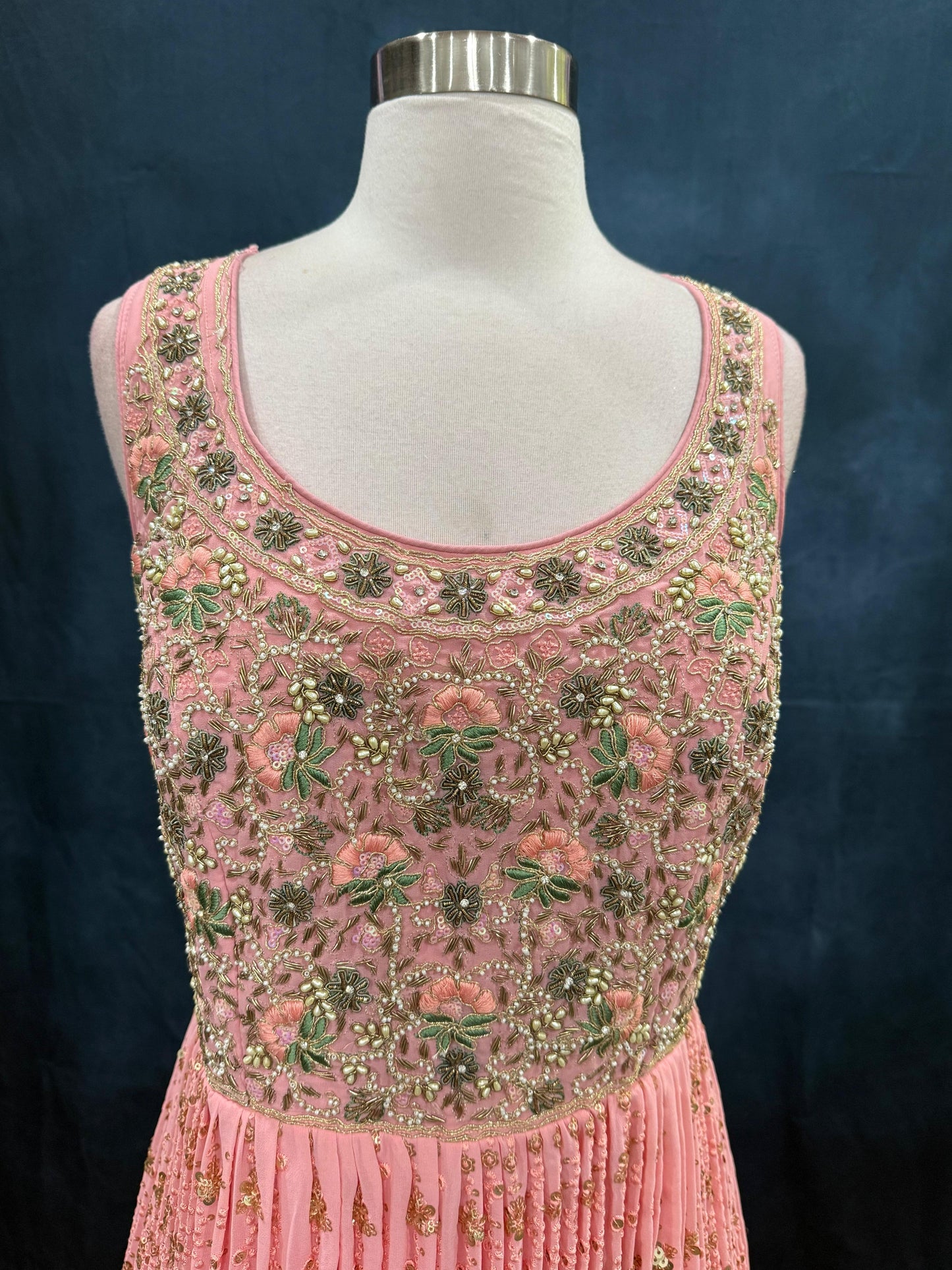Lovely pink, a lot of sparkle. The perfect pick for sangeet soirées or reception glam. Available in size 42.