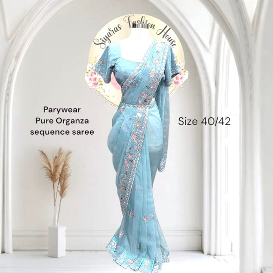 Stunning Parywear Pure Organza sequence saree intricate sequences and delicate fabric combination. Available in size 40/42 Can be altered