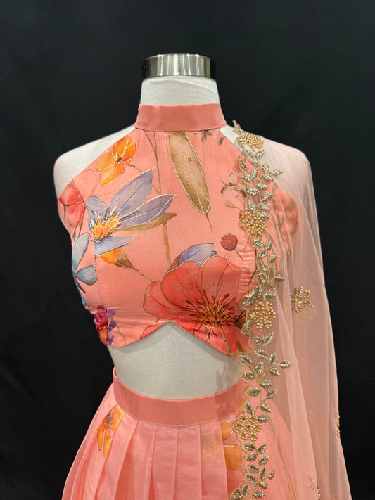 Step into elegance with this stunning peach floral lehenga set, perfect for festive occasions, weddings and receptions. Available in size 34/36/38.