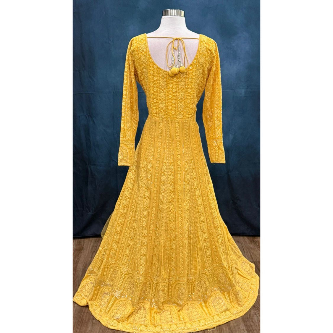 Beautiful party wear yellow Chikankari long gown available in size 40. Perfect for wedding/ sangeeth/ birthday parties and other occasions.