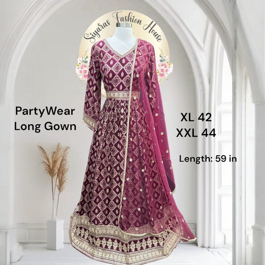 Exquisite embroidered Anarkali gown in a burgundy hue! Paired with a delicate net dupatta. Crafted from pure viscose jacquard silk 42/44