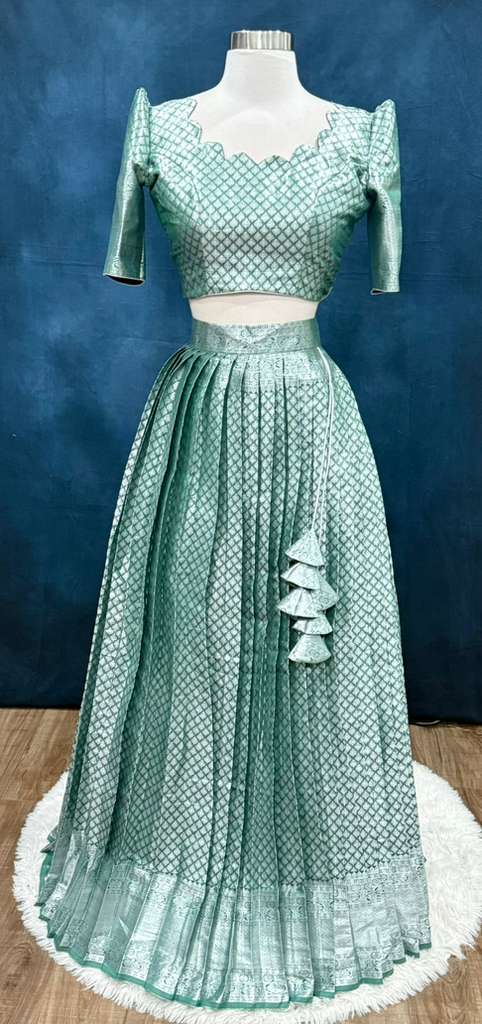 Gorgeous Kanchi Silk half Saree. Owning the style in a stunning half saree. Available in size 36