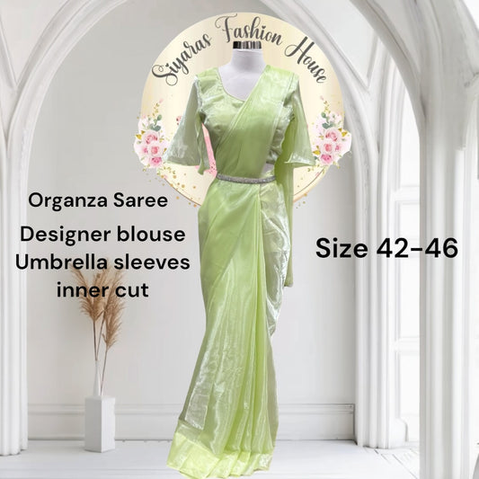 Dazzling organza saree in tow shades green with a designer umbrella blouse inner cut . Perfect for weddings and festive celebrations