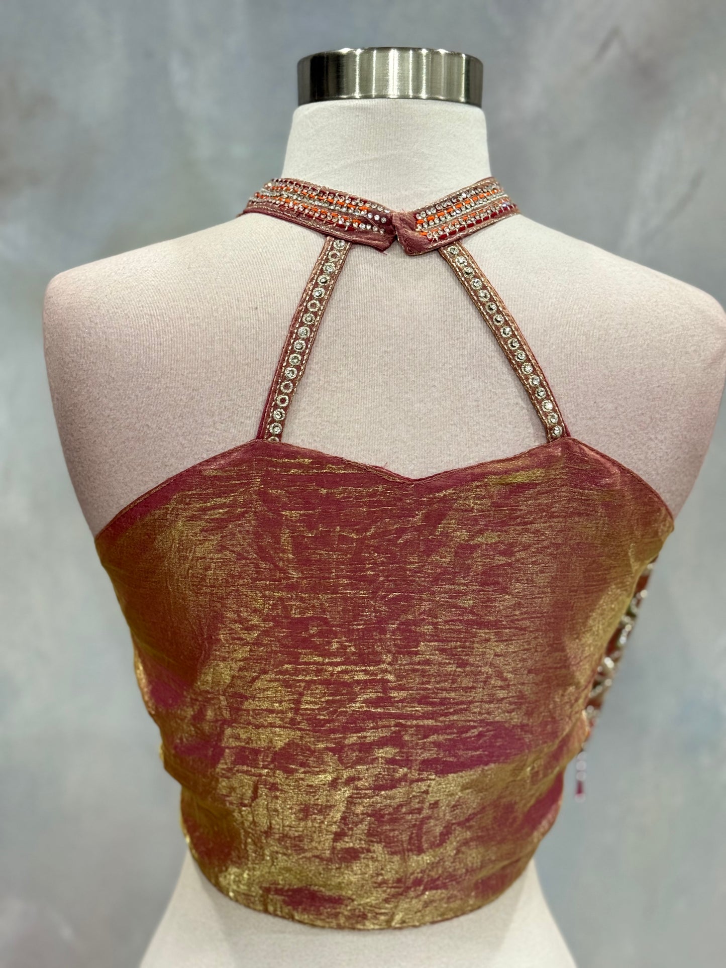 Stunning blush pink Indo-Western drape outfit featuring a beautifully embroidered tube-style blouse adorned with intricate stone, sequin, and zari work
