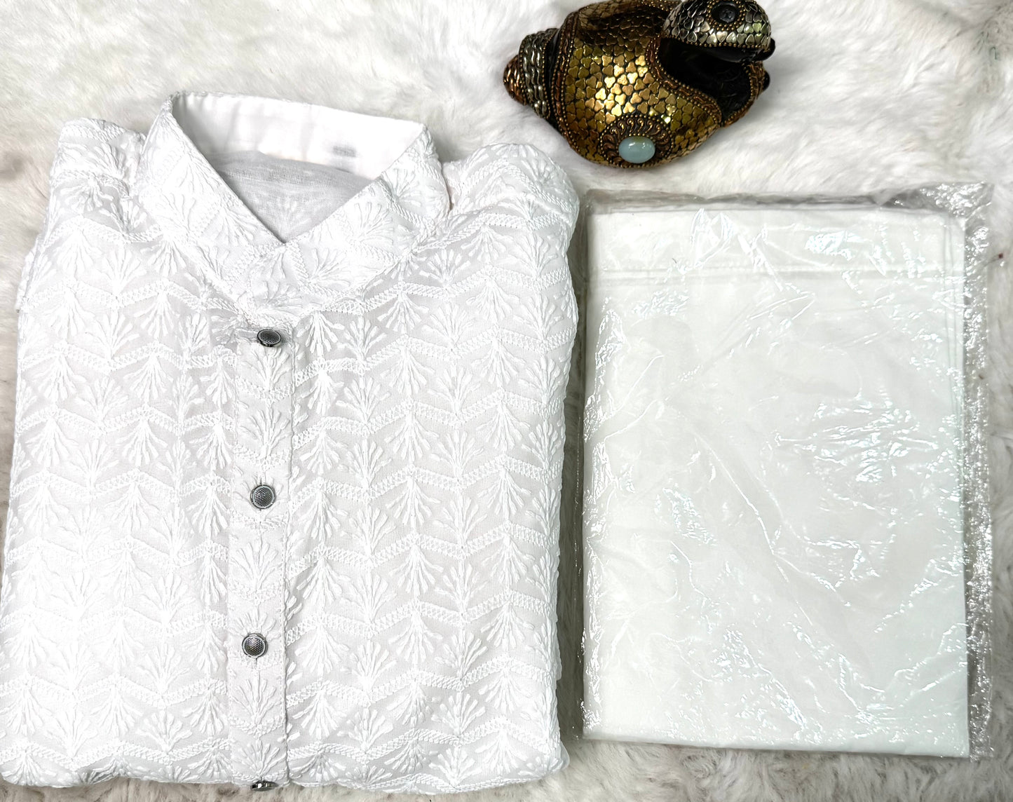 Beautiful heavy Chikankari men’s kurta set with white pant. Available in size 36