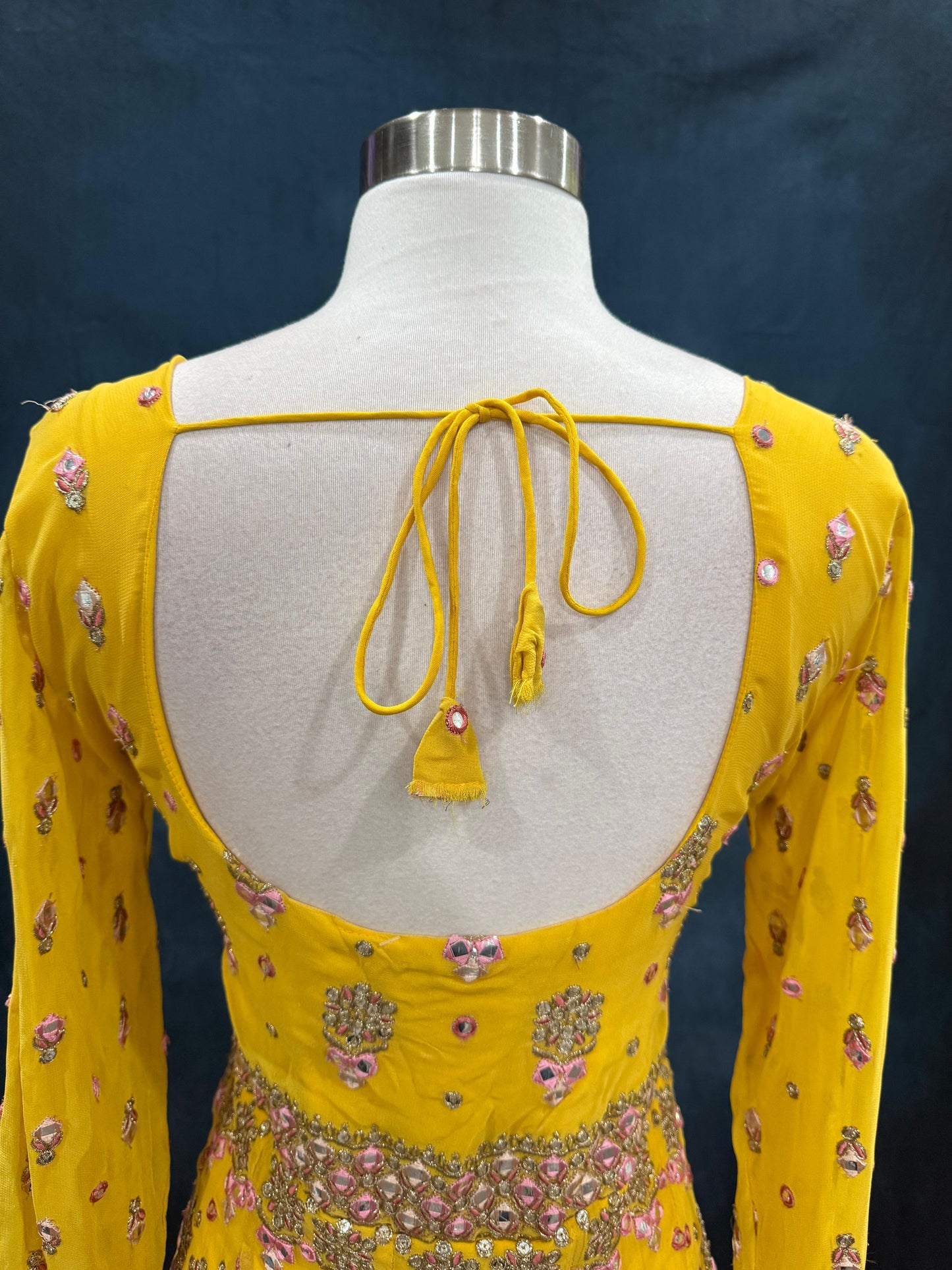 Soft hues, regal charm and magic in yellow. Available in Size 42. Step into royal vibes with this gorgeous georgette long gown & dupatta.