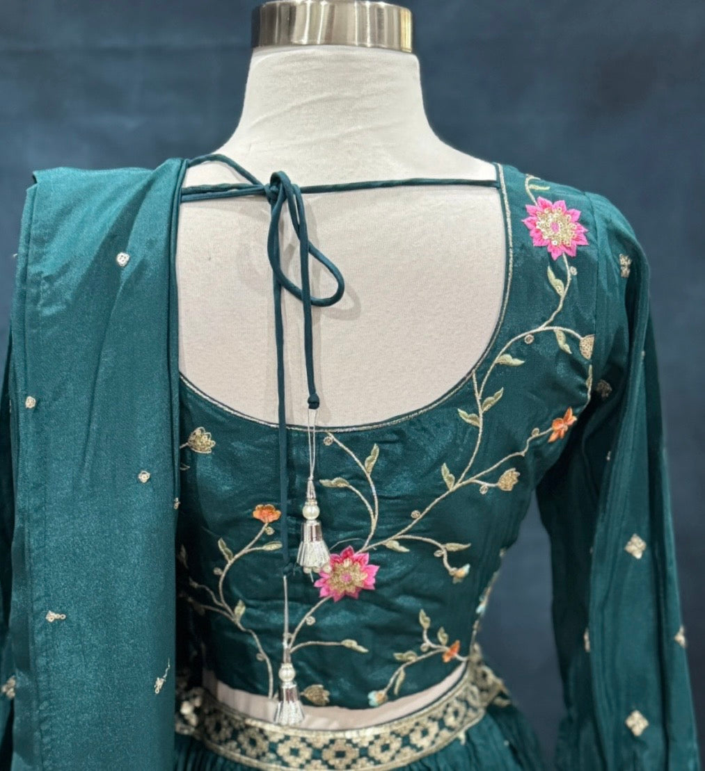 Beautiful party wear lehenga with colorful embroidery and sequins. Available in size 40.