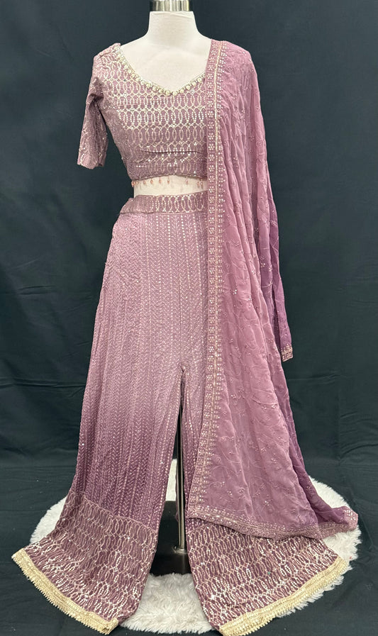 Elevate your ethnic wardrobe with this elegant Embroidered Palazzo Set, designed for festive. Available in size 38.
Dusky Lavender to dark. Embroidered Palazzo Set with Dupatta
