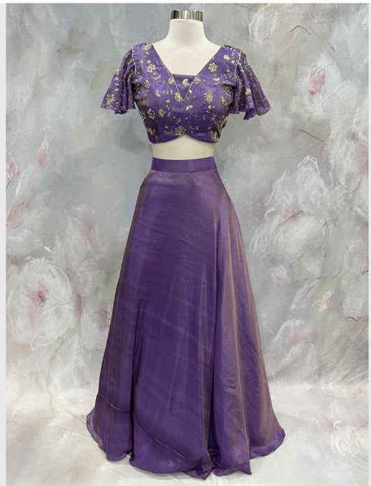 Custom elegance by Siyaras Fashion House. Size 36-38. This customized tissue crop top lehenga set from Siyaras Fashion House features a rich
