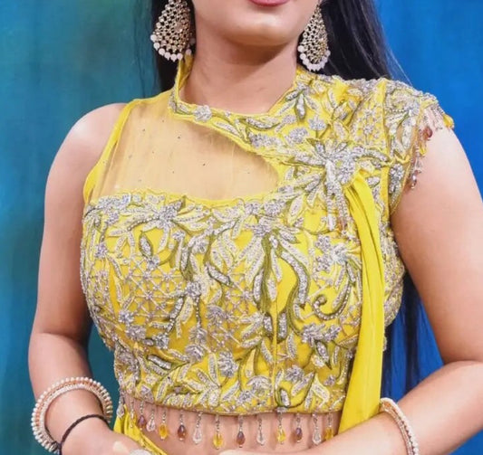 Trendy Croptop lehenga with Drape style attached Dupatta with trendy skirt for Haldi or party dress. Available inSize 40. Alterations extra