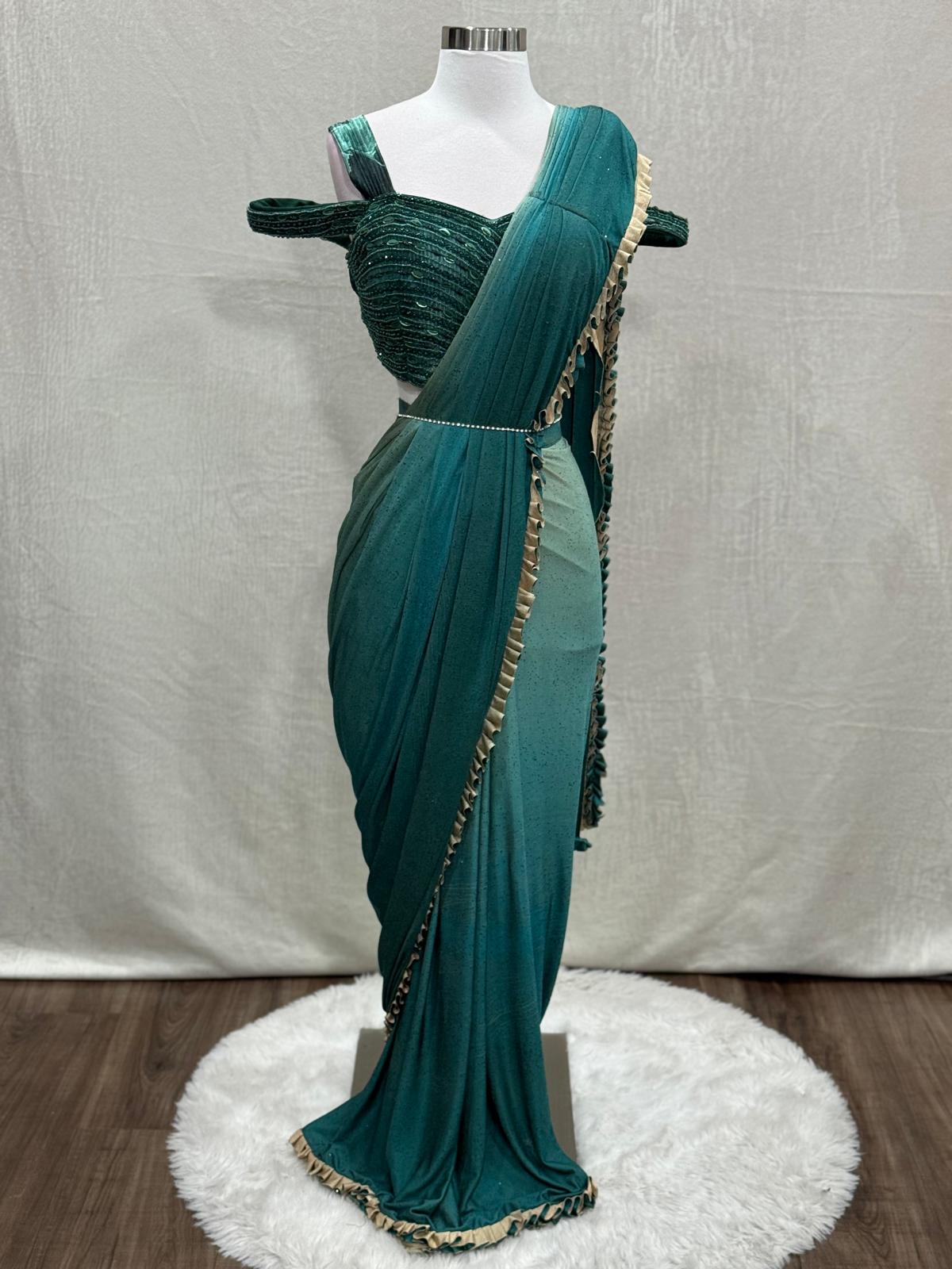 Lovely partywear drape saree/ ready to wear saree. Available in size 36/38.