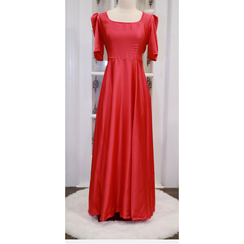 Beautiful peach red color satin long gown with organza Dupatta. The gown has lining and comes with tassels.Size:40, 44 length: 55 inches