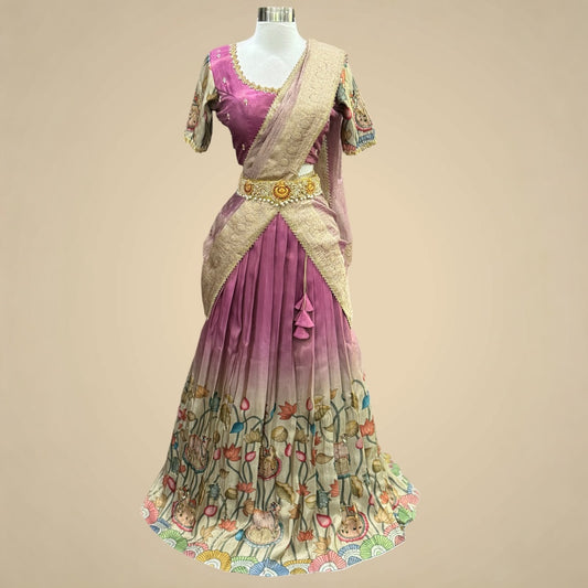 Tissue Silk Kalamkari Half Saree with hand work blouse.
Perfect for weddings, festivals, or just making a royal statement!
Available in Size: 36–40