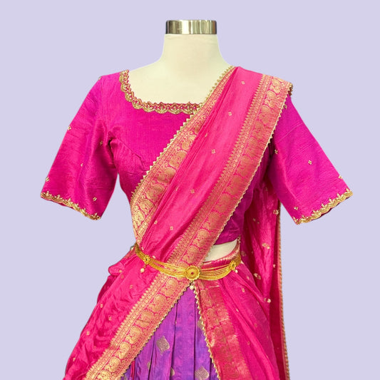 Beautiful dual shade Silk half saree with pattu border. Available in size 38 to 42