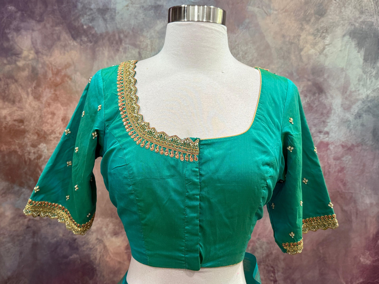 Beautiful Kanchi Pattu Saree with Hand work on blouse. Available in size 40 to 44. Can be altered to your size.