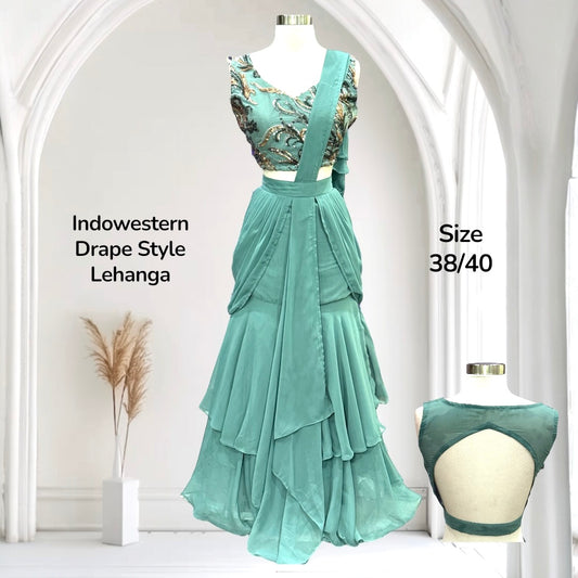 Steal the spotlight with this stunning Indo-Western drape style lehanga 😍🌸. The layered flowy skirt is available in size 38/40.