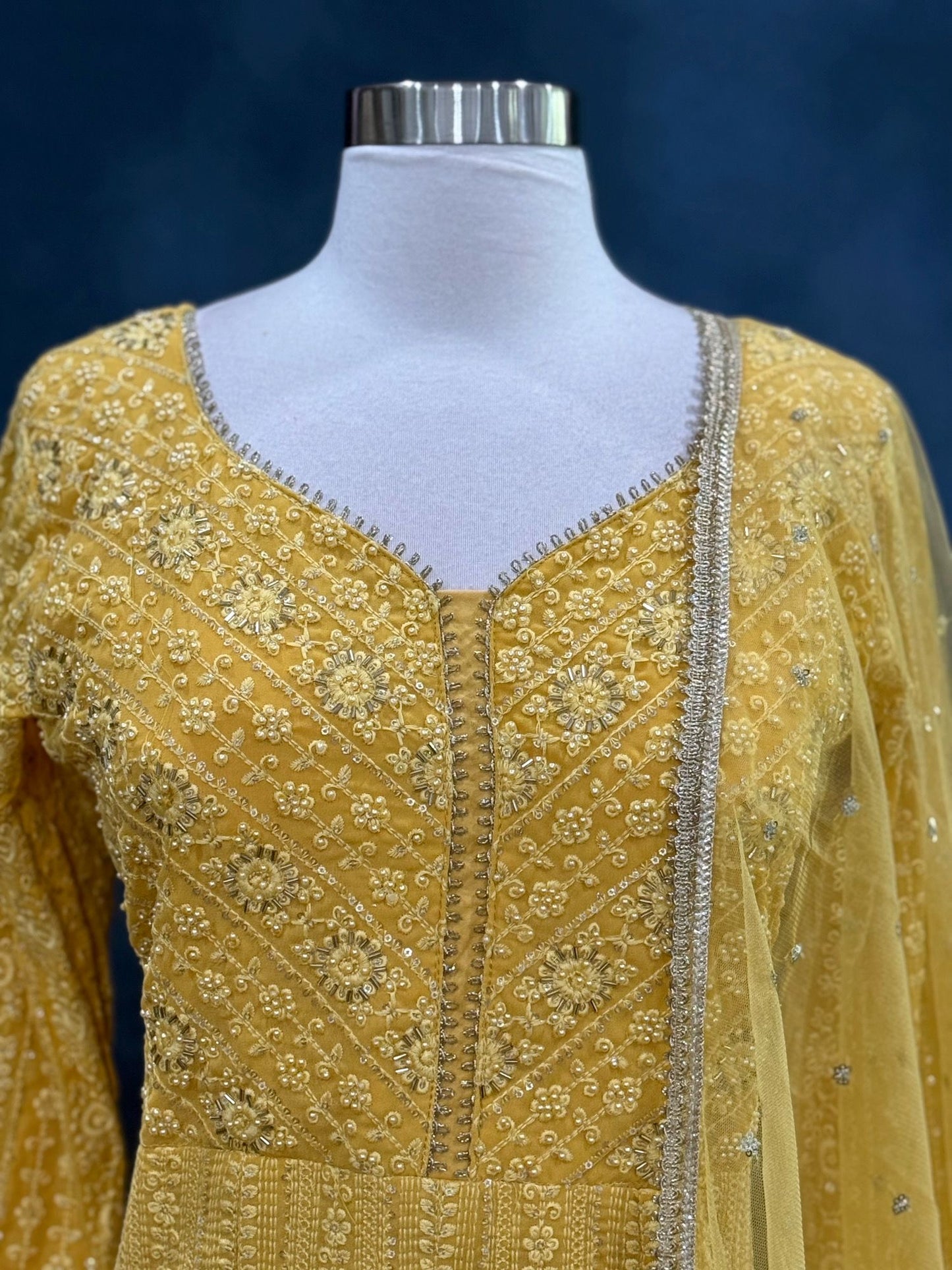 Beautiful party wear yellow Chikankari long gown available in size 40. Perfect for wedding/ sangeeth/ birthday parties and other occasions.