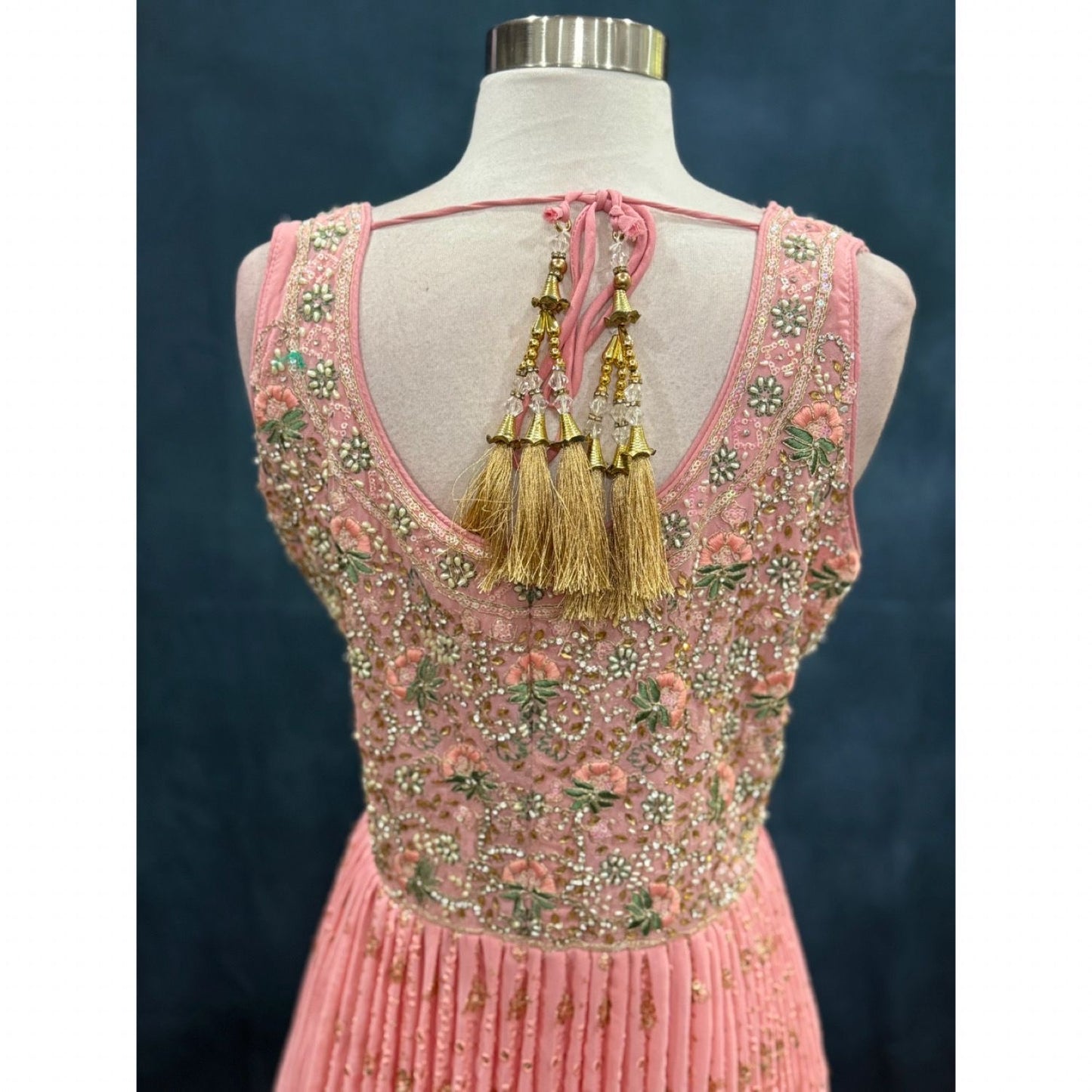 Lovely pink, a lot of sparkle. The perfect pick for sangeet soirées or reception glam. Available in size 42.