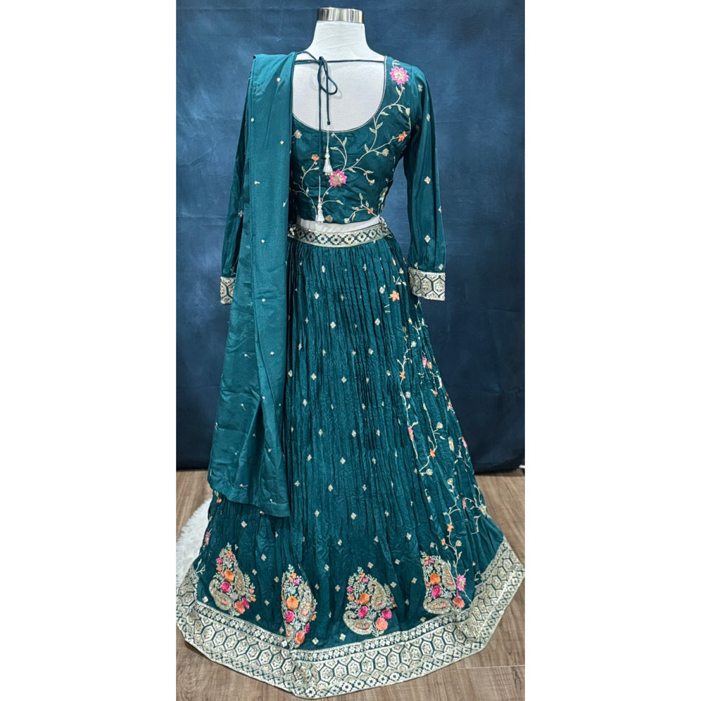 Beautiful party wear lehenga with colorful embroidery and sequins. Available in size 40.