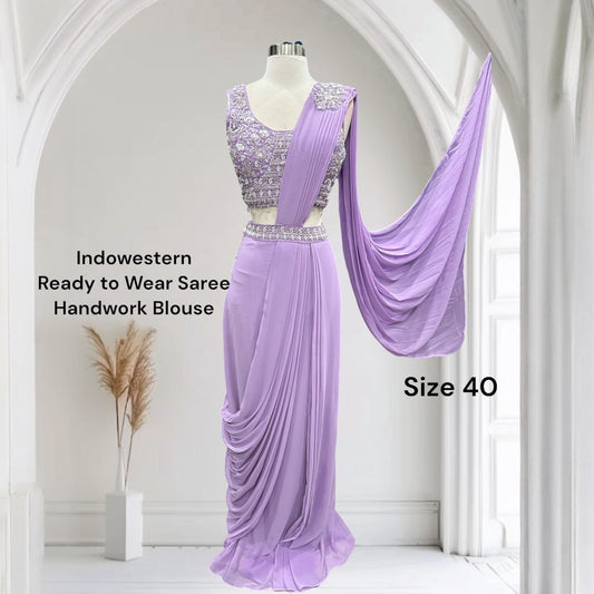 Beautiful Drape style lehenga with crystal and beads work. Available in size 40