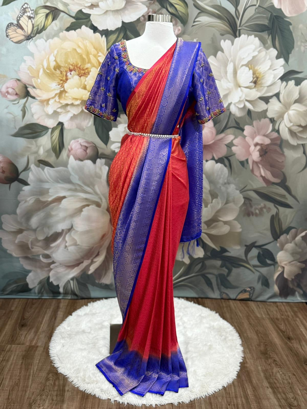 This stunning Soft Silk Saree paired with a royal Maggam work blouse. The rich hues of red and blue blend beautifully, making it perfect for weddings, festive vibes. Available in size 40 - 42.