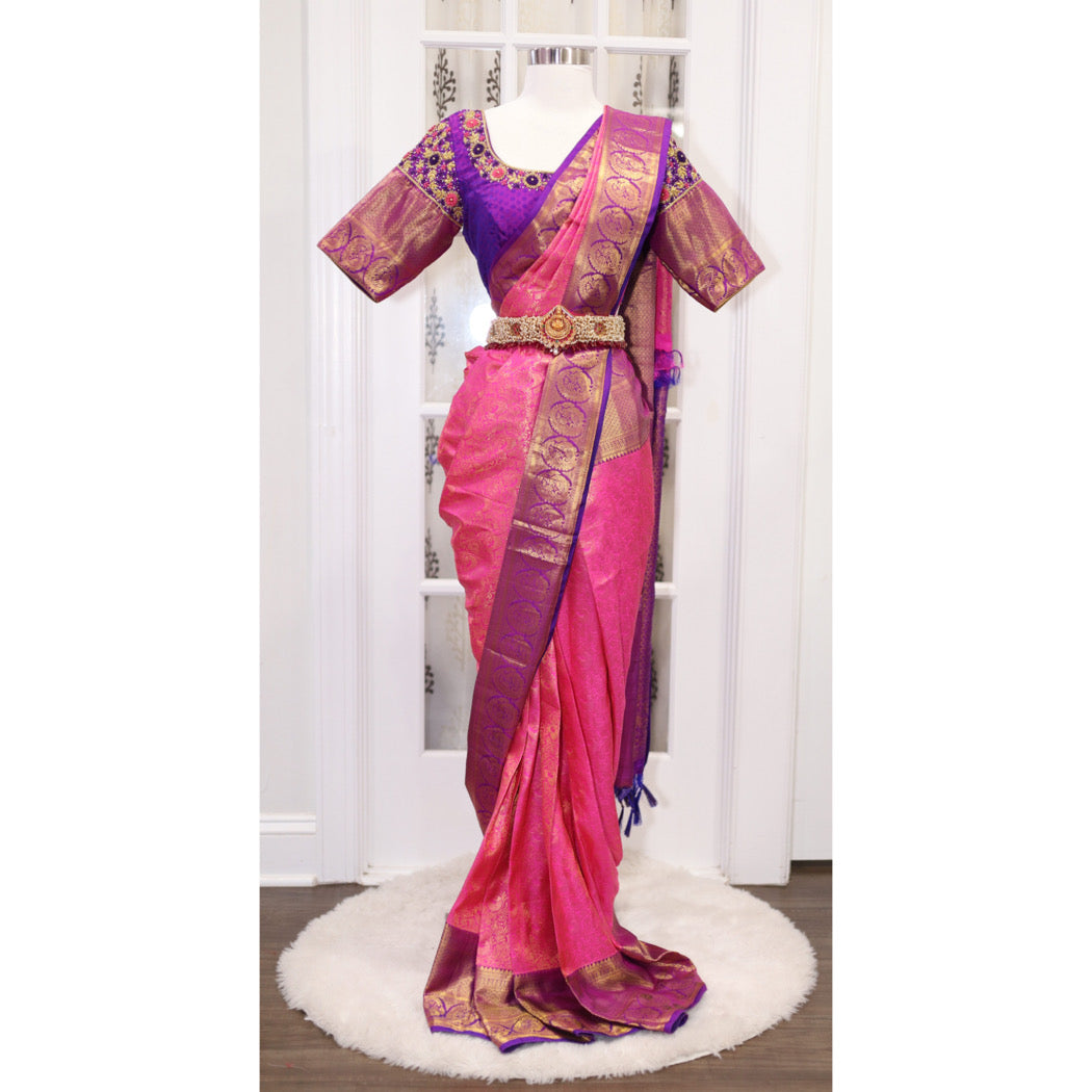Elegance personified! 💖💜 Pure Kanjeevaram silk saree in Rani pink and Purple combo, certified with Silk Mark. Adorned with exquisite Maggam work blouse featuring Zardosi and knot work. Size 40 plus 3 in margin.