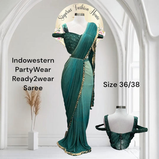 Lovely partywear drape saree/ ready to wear saree. Available in size 36/38.