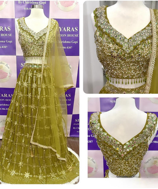 Dancing in hues of mehendi green 💚✨ A perfect blend of tradition and elegance for the Mehendi celebration!! Fits Size 38 and length of lehanga is 43 inches.