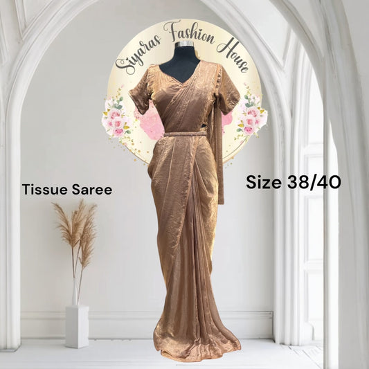 Beautiful tissue saree with blouse. Available in size 38 and 40. Shorts sleeves can be attached.