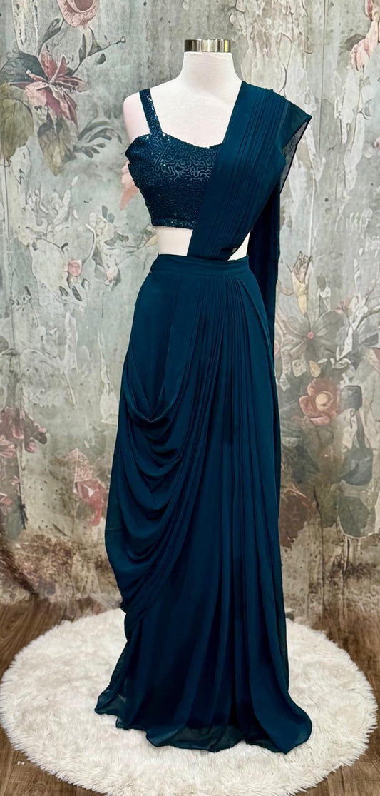 Beautiful Drape style lehenga in teal blue color. Available in size 34/36.