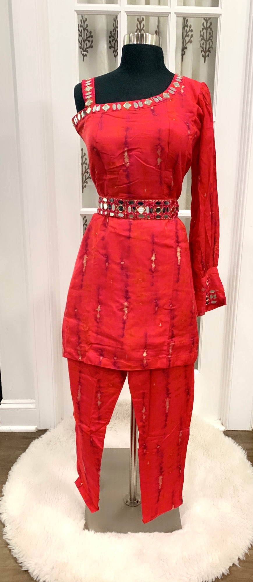 Beautiful red shibori design one shoulder full sleeve 3 pc set with intricate mirror work with waist belt