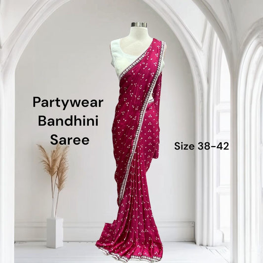 Beautiful Bhandini Partywear Saree perfect for any occasion. White blouse available in size 38 and 42.