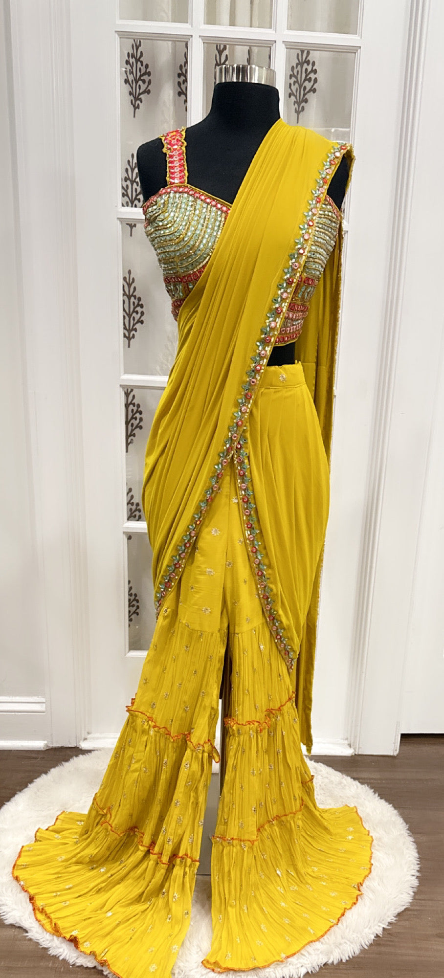 Beautiful Drape style yellow Sharara set, adorned with stunning mirror work comes with attached dupatta size 40/42
