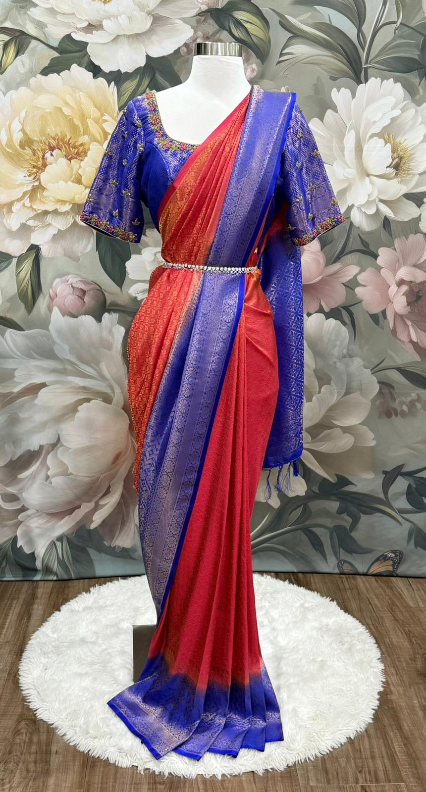 This stunning Soft Silk Saree paired with a royal Maggam work blouse. The rich hues of red and blue blend beautifully, making it perfect for weddings, festive vibes. Available in size 40 - 42.