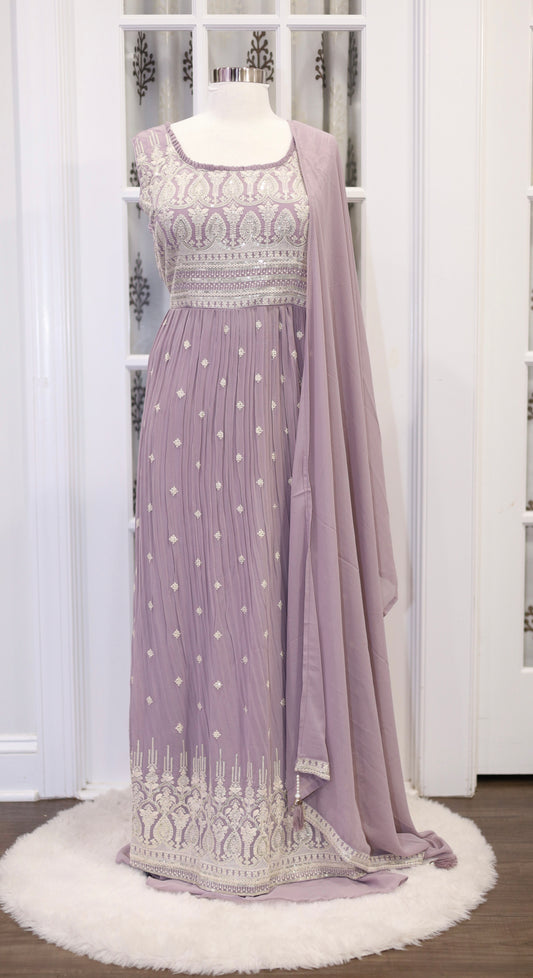 Elegant and comfortable Nyra cut outfit, complete with palazzo pants and a beautiful dupatta! 💃🌟 Sizes pink 42, and Lavender 44.