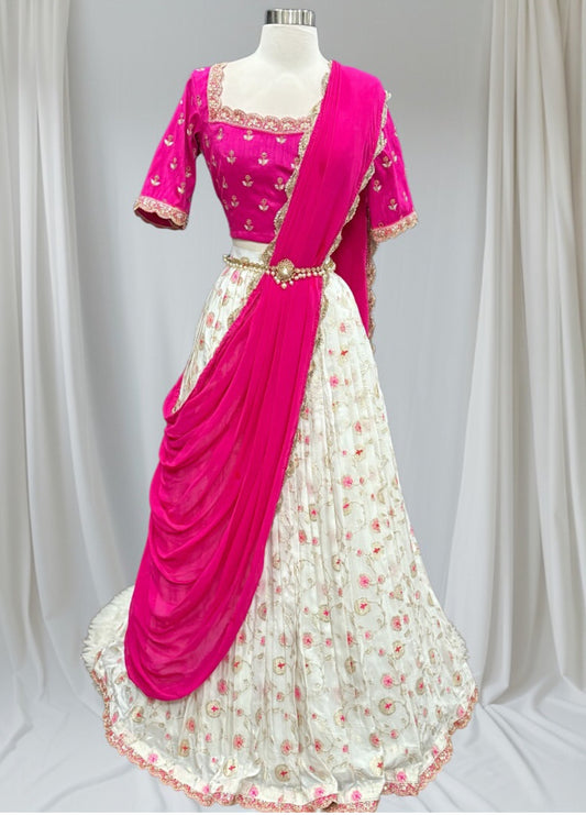 Pretty in pink & blooming in style.
Raw silk blouse paired with a charming Banarasi silk dyeable floral lehanga… elegance redefined
Size 36/38