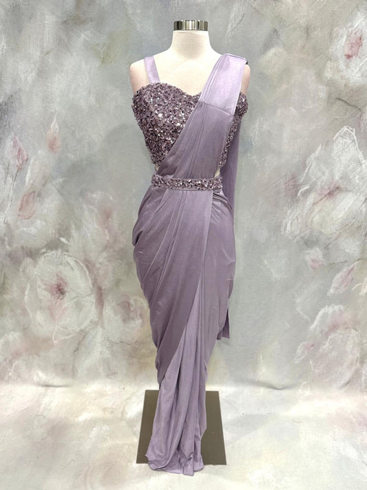 Elegance meets modern glamour! This stunning Indo-Western Ready-to-Wear Saree in a dreamy lavender shade. Size is 36/38