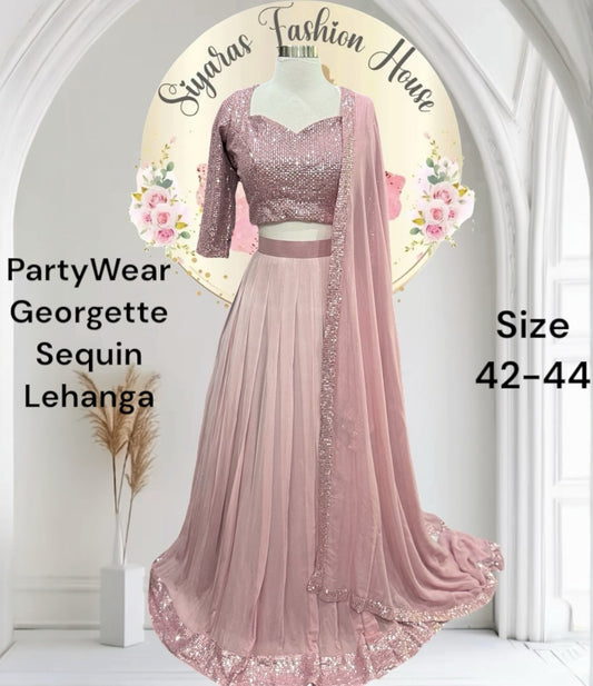 Customized Rose Gold Georgette sequin Lehanga from Siyaras Fashion House. Available in size 40/42 to 46