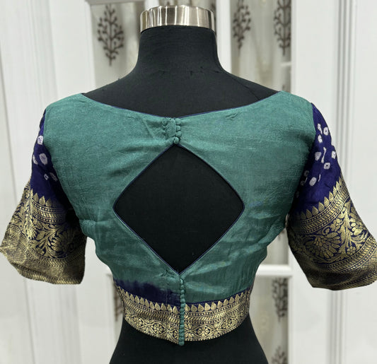 Beautiful Kanjivaram art silk with Bandini Green and Navy blue combo saree with Pattu border. Blouse fits size 40 to 44.