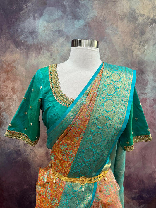 Beautiful Kanchi Pattu Saree with Hand work on blouse. Available in size 40 to 44. Can be altered to your size.