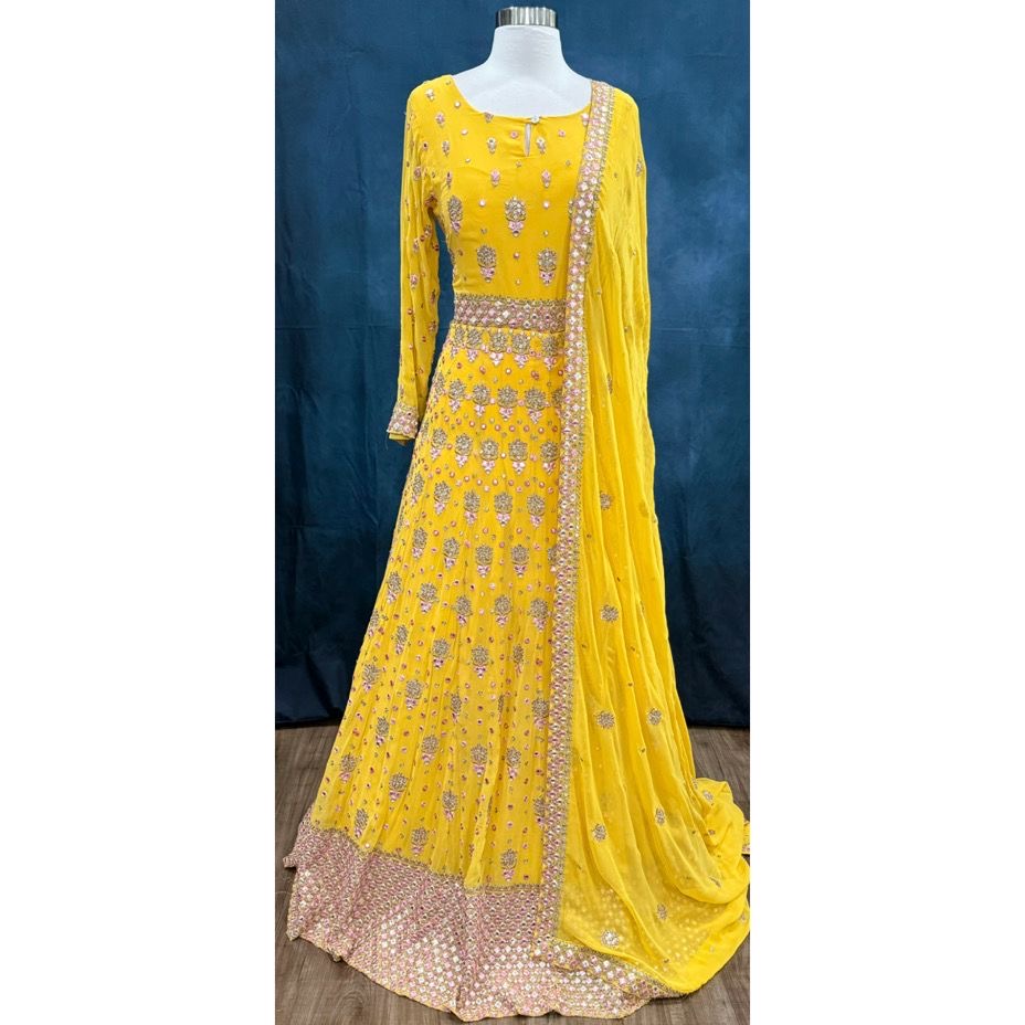 Soft hues, regal charm and magic in yellow. Available in Size 42. Step into royal vibes with this gorgeous georgette long gown & dupatta.