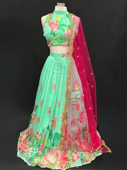 Customized Organza Lehenga / Half Saree in Green  and pink combo. Available in size 34/36/38.