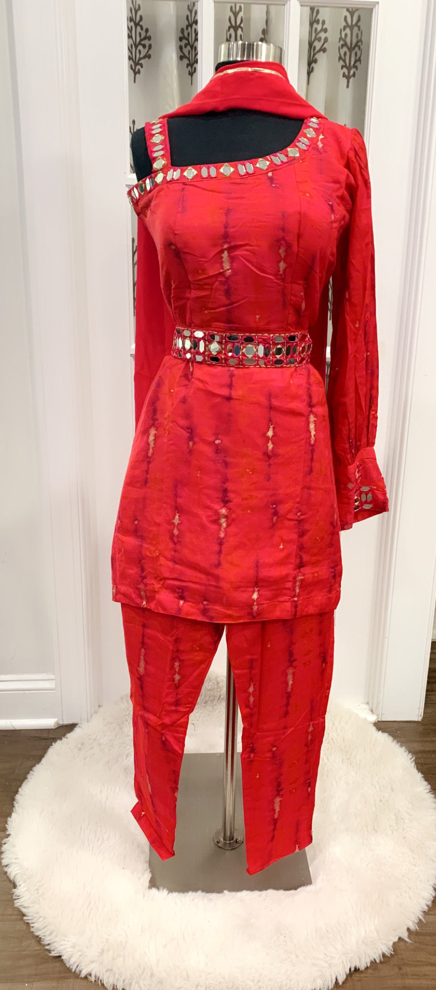 Beautiful red shibori design one shoulder full sleeve 3 pc set with intricate mirror work with waist belt