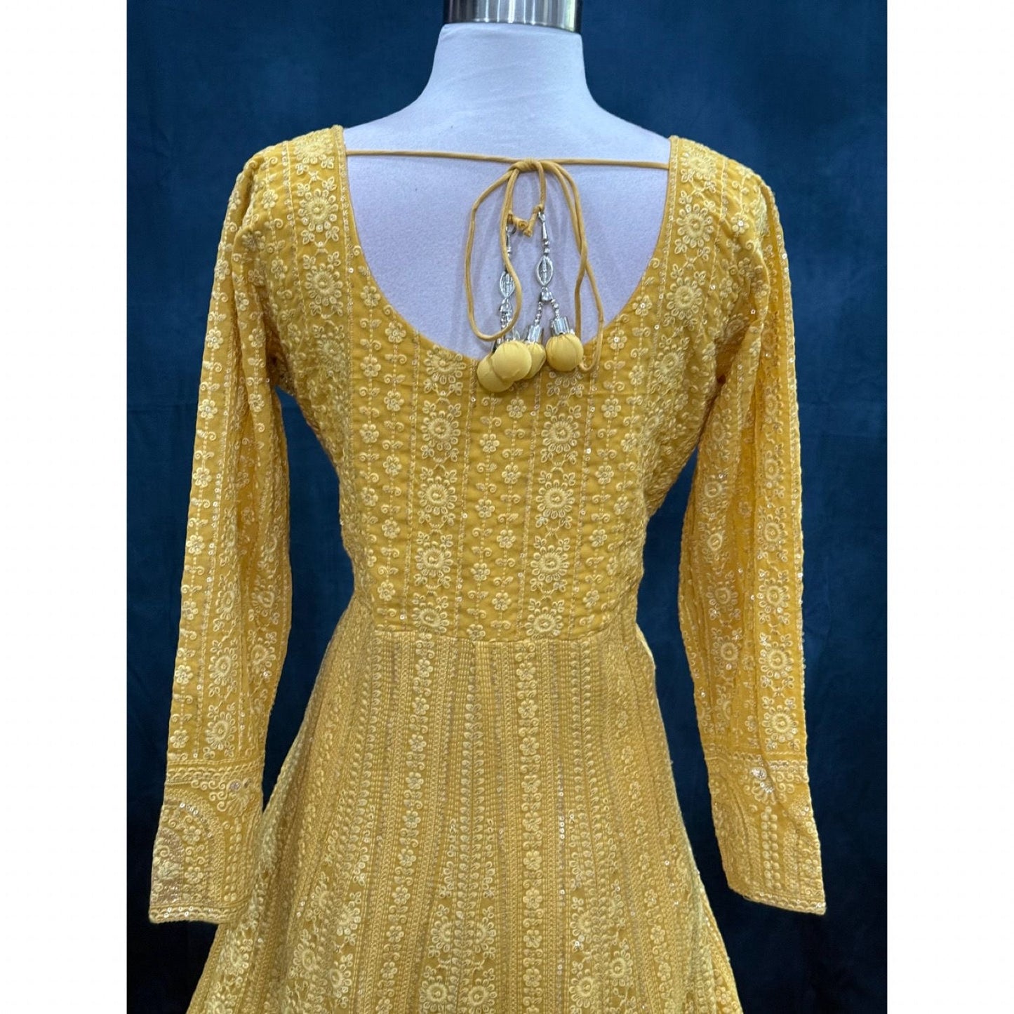 Beautiful party wear yellow Chikankari long gown available in size 40. Perfect for wedding/ sangeeth/ birthday parties and other occasions.