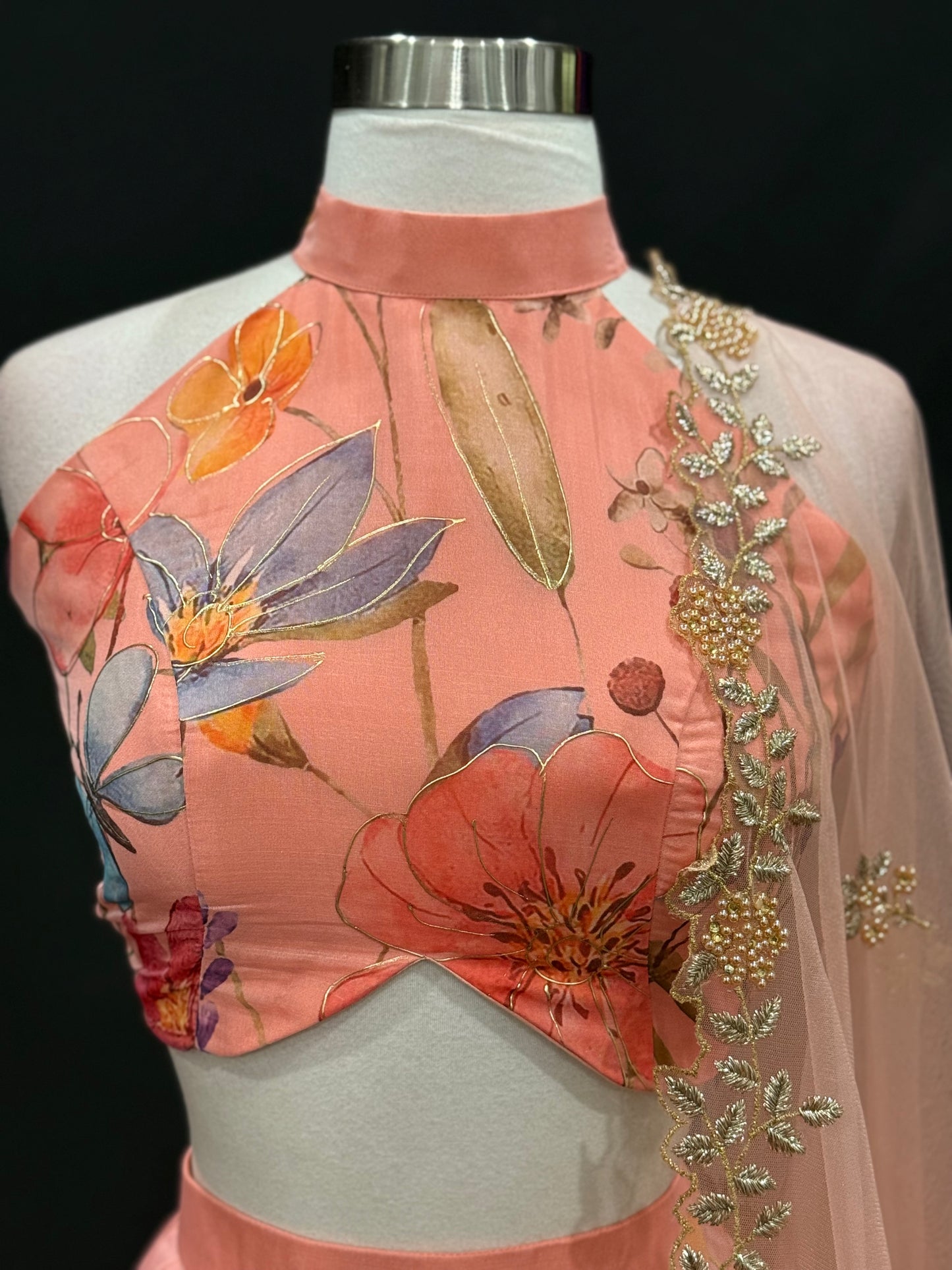 Step into elegance with this stunning peach floral lehenga set, perfect for festive occasions, weddings and receptions. Available in size 34/36/38.