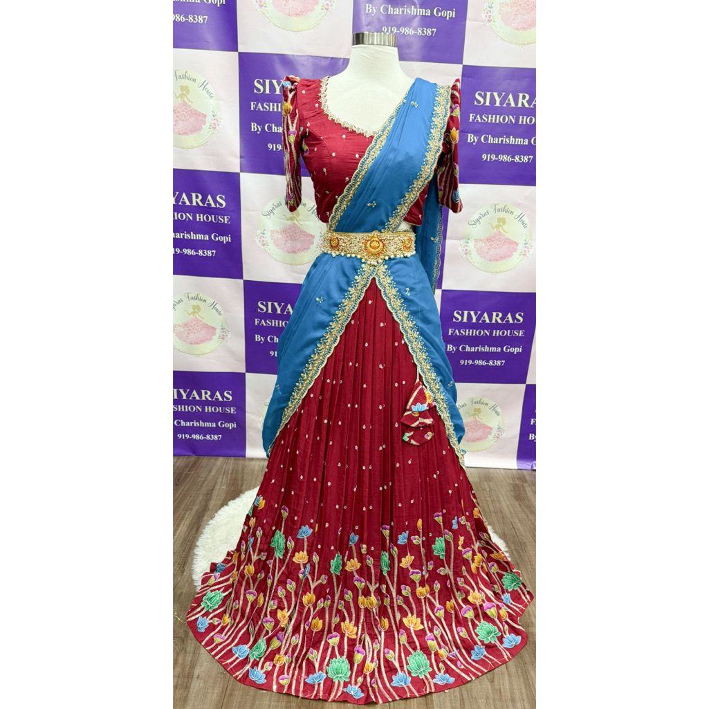 This stunning customized Kalamkari all-over work Half Saree / Langa Voni is crafted to perfection with vibrant sequence embroidery work and elegant detailing designed Maggam work blouse (Size 36–40)